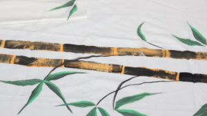 Bamboo hand painted on synthetic off white fabric