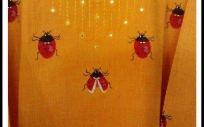 lady bird painted on kurthi